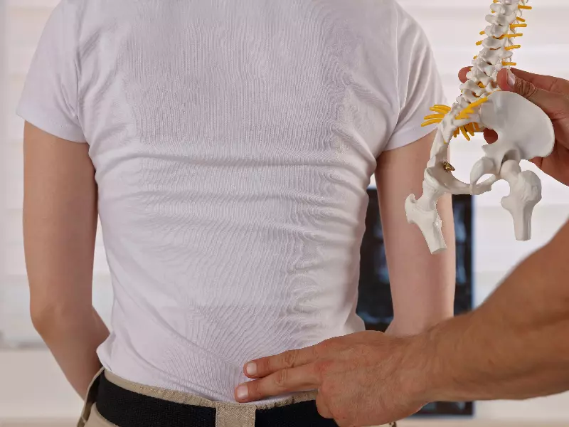 Pinched Nerve Treatment Near Me in Centennial, CO. Chiropractic Exam For Pinched Nerve Pain Relief.